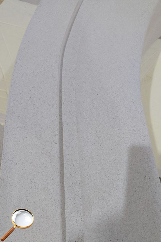 Фактура лицевой поверхности детали из стеклофибробетона очень похожа на природный песчаник Фактура лицевой поверхности детали из стеклофибробетона очень похожа на природный песчаник